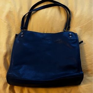 American Leather.  Black leather purse. I believe it is NWOT.